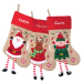 Julestr&oslash;mpe med julefigurer, brodert navn